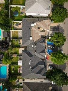 Arial view of a Vanity Roofing team installing a new roof in kingston