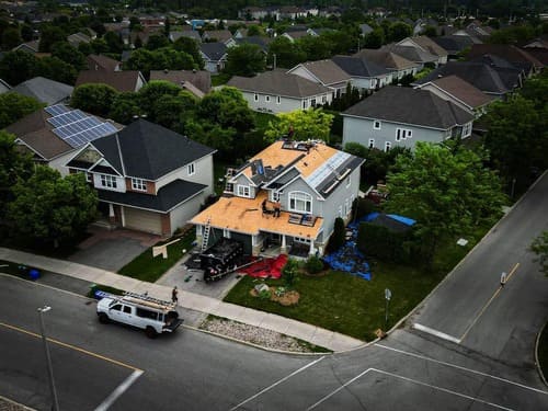 arial view of Vanity Roofing completing a residential roof replacement in kingston